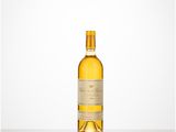 a bottle of white wine sitting on top of a table