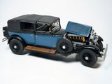 a model of a blue car with a black top