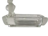 a clear glass bottle with a glass figure on top of it