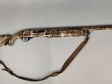 a rifle that is sitting on top of a table