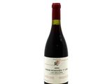 bottle of red wine with a red cap on a white background