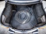 a car trunk with a speaker in it