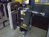 a machine that is sitting on the floor in a gym