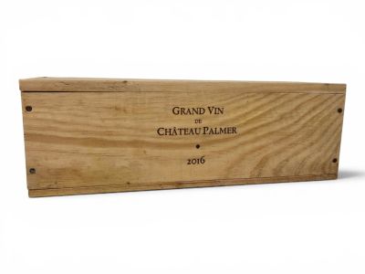 a wooden box that has a wine label on it