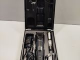 a black case with tools in it sitting on a table