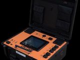 an open case with a tablet inside of it on a black background