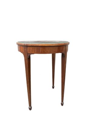 a wooden table with a glass top on a white background