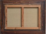an image of a picture frame with a picture hanging on the wall