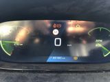 the dashboard of a car with a digital display on it