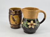 two cups sitting next to each other on a table