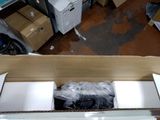 a cardboard box with a bunch of items inside of it