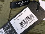 a label on a sweater that says marcianoo