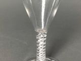 a wine glass with a rope wrapped around it