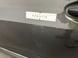 a close up of a sticker on the hood of a car