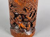 an image of a wooden cup with a dragon on it
