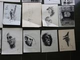 a lot of drawings on the wall of a room