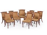 un ensemble de six chaises avec dossier et pieds en rotin