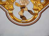 a close up of a plate with a picture of a woman on it