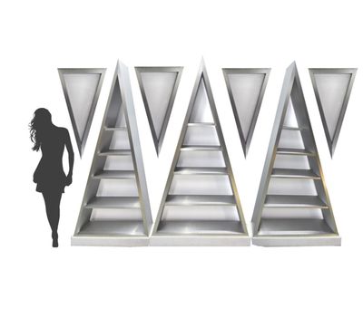 a woman that is standing in front of a set of stairs