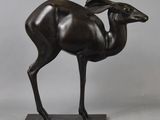 bronze sculpture of a gazelle on a marble base