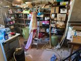 an image of a messy room with a lot of stuff on the floor