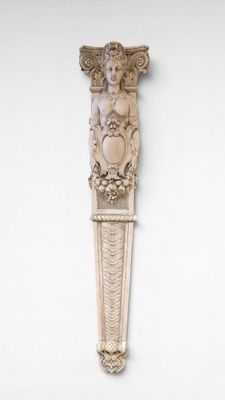 a wall decoration with a statue on the wall