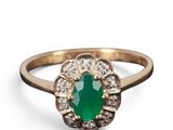 an emerald and diamond ring