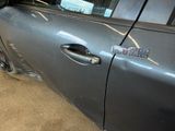 a car that has a sticker on the side of it