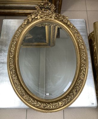 a mirror that is sitting on the floor in front of a mirror