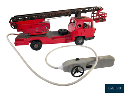 a toy fire truck with a hose attached to it