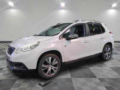 a picture of a white car parked in a garage