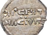 an ancient silver coin with the inscription of the roman empire on it