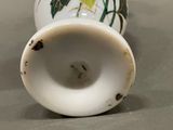 two vases that have been painted with birds on them