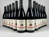 six bouteilles de vin rouge alignées