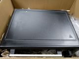 a box that has a laptop inside of it