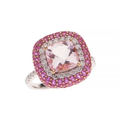 a close up of a pink and white diamond ring