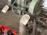 an image of a man working on a machine