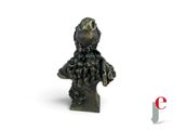sculpture of a bust of a man with a bird on his head