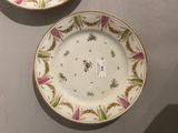 two plates that are sitting on a table
