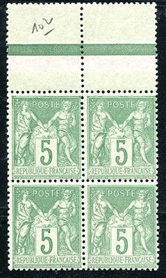 a green and white stamp with a picture of a woman on it