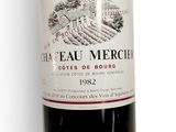 a bottle of wine that is sitting on a table