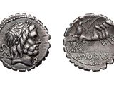 a close up of a coin with a horse on it