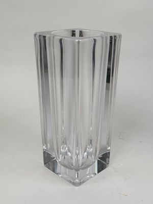 a glass vase that is sitting on a table