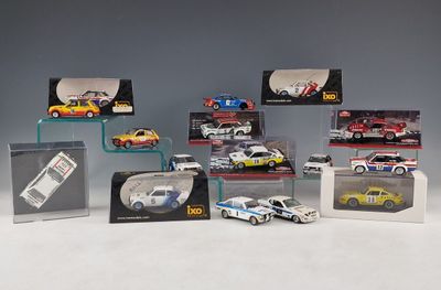 a lot of toy cars on display in a display case