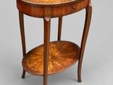 a wooden table with a shelf on top of it