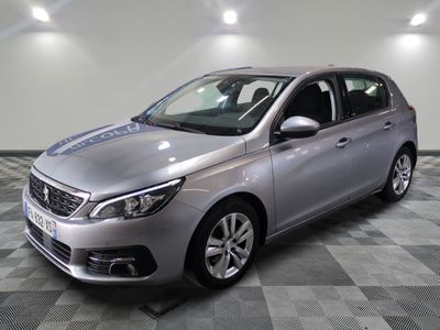 a picture of a silver car on a checkered floor