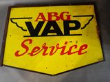 an old yellow and red sign that says abc vap service