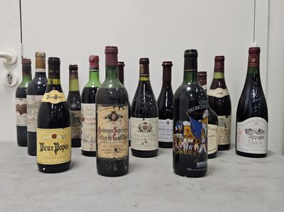 many bottles of wine lined up on the counter