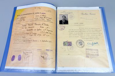 an open passport book with a picture of a man on it