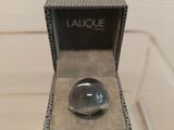 a picture of a ring in a box on a table